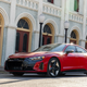 A photo of a red Audi E-Tron GT electric car.
